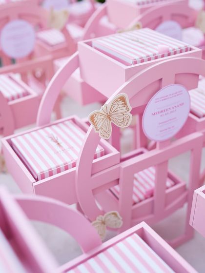 Whimsical, thoughtful, and unforgettable. These pink rocking horse hampers were created for a special birth announcement, designed to craft sweet memories, box by box.