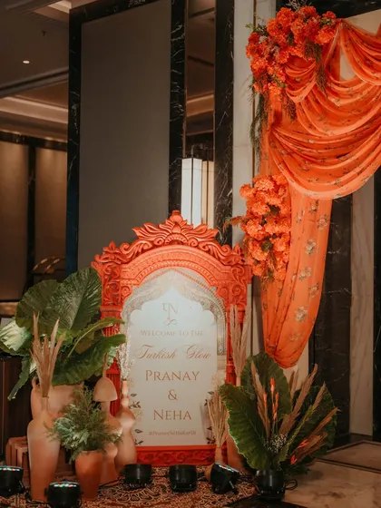 Another view of the welcome sign for the Turkish-themed Haldi, showing how we integrate decor elements like floral arrangements and drapery to create a cohesive look.