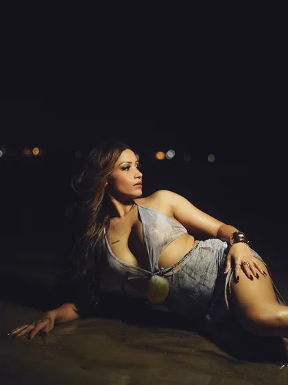 A dramatic night shoot on a Mumbai beach with model Alendra Bill. This photo demonstrates my technical skill in low-light conditions to create moody and captivating beachside glamour shots.
