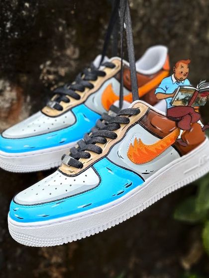 A tribute to a classic, The Adventures of Tintin on a pair of Nike Air Force 1s. I used a sketchy, comic book style and even added a tiny detail of Snowy on the swoosh. It’s all about those little hidden gems.