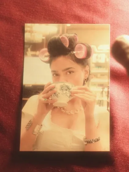A polaroid-style image of the same scene, adding a nostalgic and dreamy filter to the behind-the-scenes glam moment.