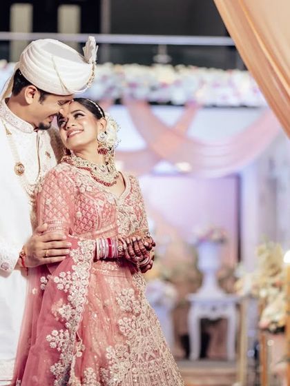 A romantic, happy portrait of Nupur and Chinmay. The soft lighting and their joyful expressions make this a timeless photograph from their wedding day.