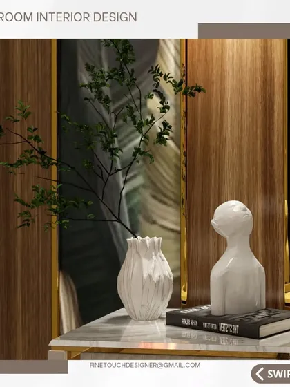 A detail shot of the bedside table decor. We believe in adding personal touches, like this sculptural vase and minimalist statue, to make a space feel curated and unique.