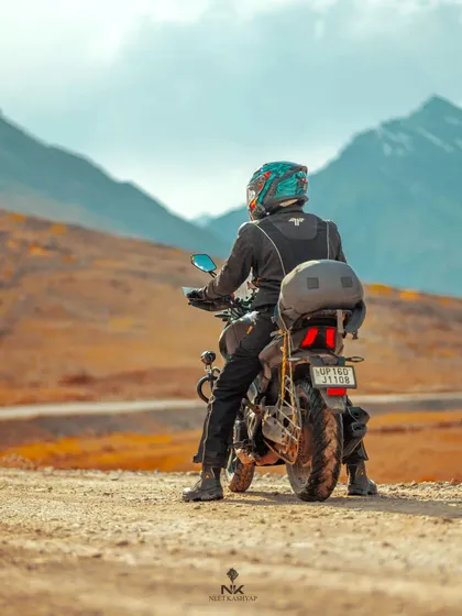 It's not just about the destination. It's about these moments on the road. I specialize in bike trip photography, capturing the rider and their machine against the epic backdrop of the mountains.