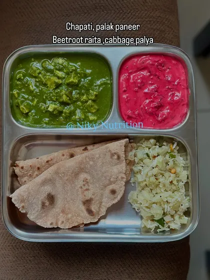 A feast for the eyes and the body. This vibrant thali includes classic palak paneer, whole wheat chapati, sautéed cabbage, and a stunning beetroot raita. It’s a perfect demonstration of how I use colorful, seasonal vegetables to pack every meal with vitamins and antioxidants.