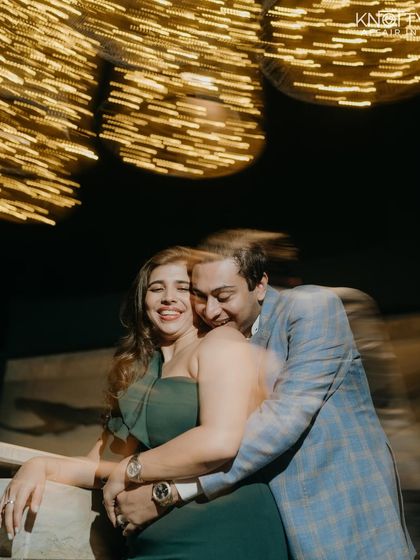 A creative use of motion blur and warm lights to create a dynamic and celebratory feel. This shot is full of energy and captures the whirlwind of excitement in a unique, artistic way.