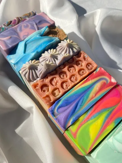A beautiful flat lay of my 2023 collection. I love seeing all the different colors, textures, and designs together. It's a testament to endless creativity!
