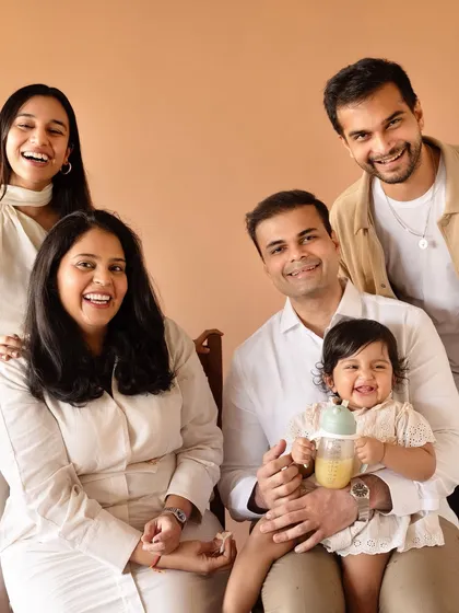 Laughter and joy fill this extended family portrait. Getting everyone together for a photo is a wonderful way to freeze a moment in time.