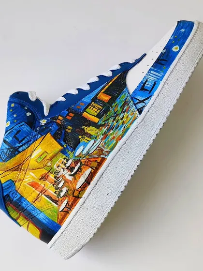 Should you wear it or frame it? This shoe features a hand-painted recreation of Van Gogh's "Café Terrace at Night." The vibrant yellows and deep blues are just mesmerizing.