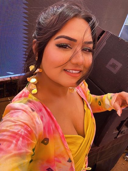 A selfie moment during a big Holi event. As a host, I'm always in the middle of the fun, capturing the best moments.