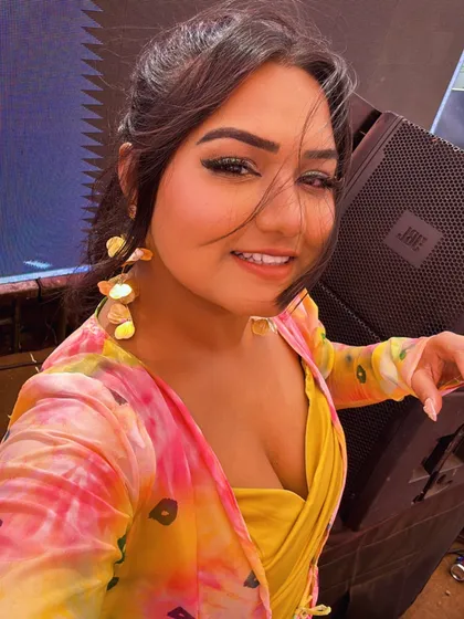 A selfie moment during a big Holi event. As a host, I'm always in the middle of the fun, capturing the best moments.