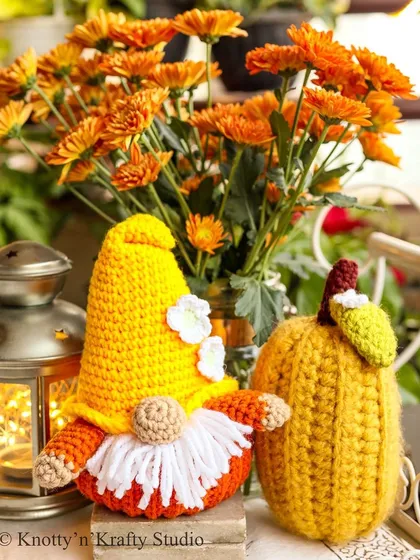 The Pumpkin Gnome with a yellow gourd, a perfect pair for your autumn decorating. These handmade toys bring a unique and personal touch to your seasonal displays.