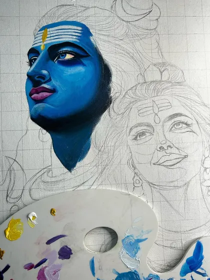 A work-in-progress shot showing the initial sketch and the first layers of paint on Lord Shiva's face, with my palette ready for the next steps.