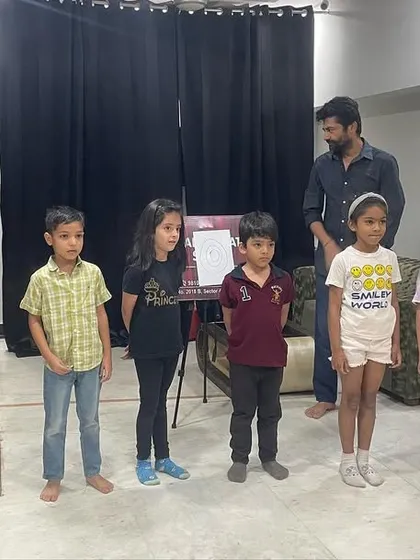 Our students standing tall and ready for their lesson. We start each class by focusing our energy and getting ready to learn and create together.