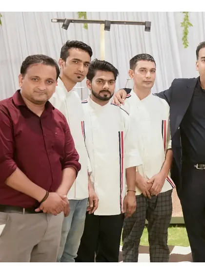 A portrait of our professional team of chefs and managers. We are the dedicated experts behind every successful event, ensuring flawless execution and exceptional service from start to finish.