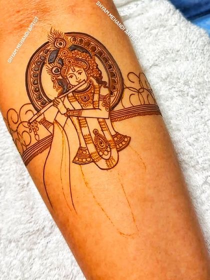 The initial outline of a Lord Krishna portrait, showcasing the clean linework that forms the foundation of the design.