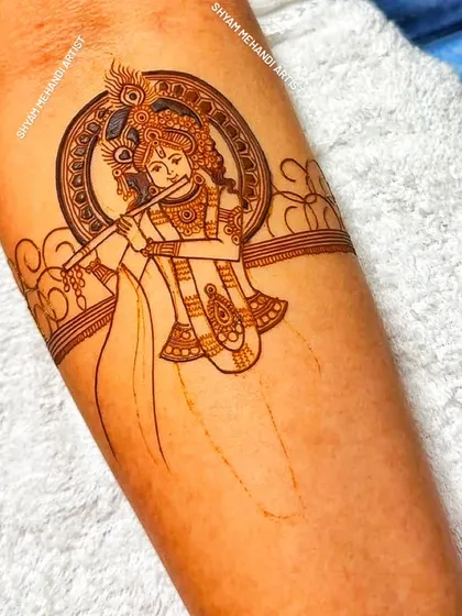 The initial outline of a Lord Krishna portrait, showcasing the clean linework that forms the foundation of the design.