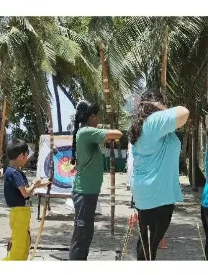 Students of different ages practicing together. Archery is a sport that bridges generations.