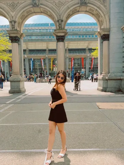 A throwback to my trip to Switzerland, wearing a simple black dress. This shows my international travel content.