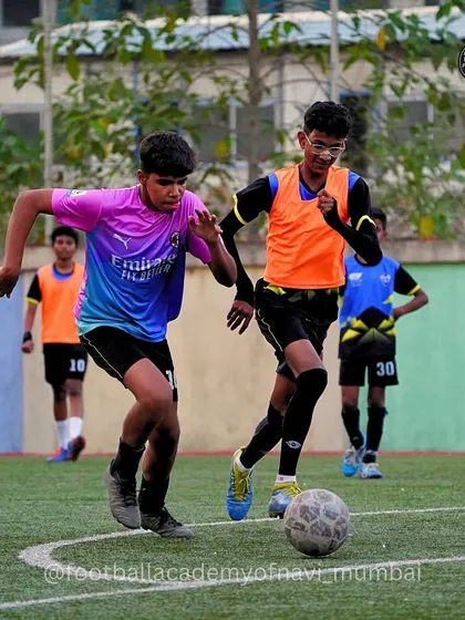 An intense moment of 1v1 defending and attacking during a drill at Shri Balaji International School.