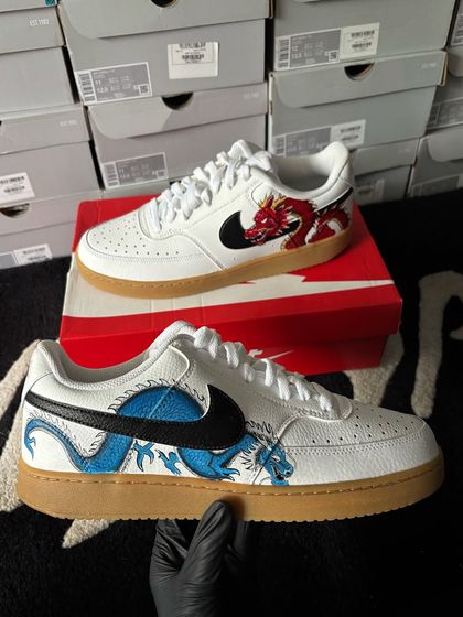 Another view of the dragon custom sneakers, showing the blue dragon in detail.