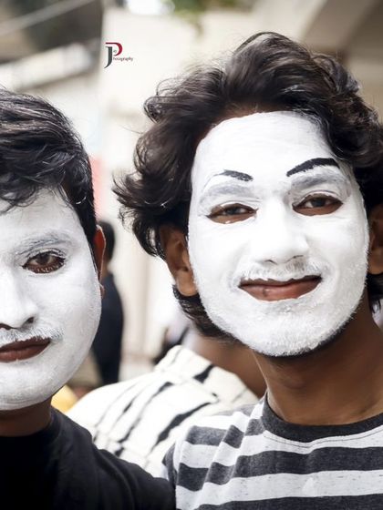 Two mime artists ready to take the stage. Their expressive faces and silent storytelling captivated the audience at our sign language celebration.