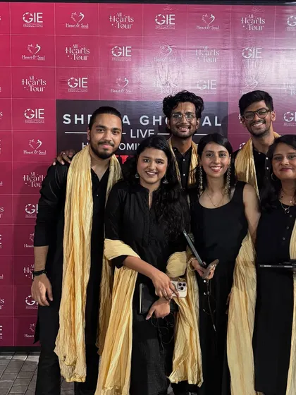 Backstage with my fellow vocalists from the Goonj choir for the Shreya Ghoshal tour. We are more than a team; we are a family that creates music together.