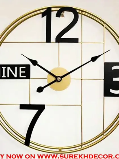 This trendy metallic wall clock plays with numbers and lines for a modern, graphic effect. The combination of black and gold with oversized numerals makes it a fun and stylish statement piece.