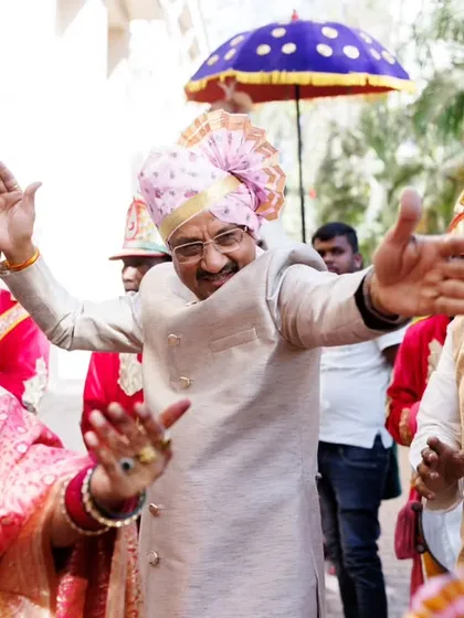 The groom's parents dancing together in the baraat procession. Their happiness and energy are a beautiful thing to witness and photograph.