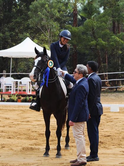 A proud moment as my rider Sanyogeeta and her horse Christy secure second place in the NEC Advance Dressage. This image captures the elegance and partnership that scored them 68.49%.