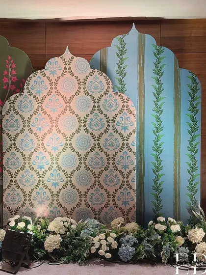A closer view of the patterned backdrop panels, showcasing the intricate designs and the soft, pleasing color palette of blue, green, and pink.
