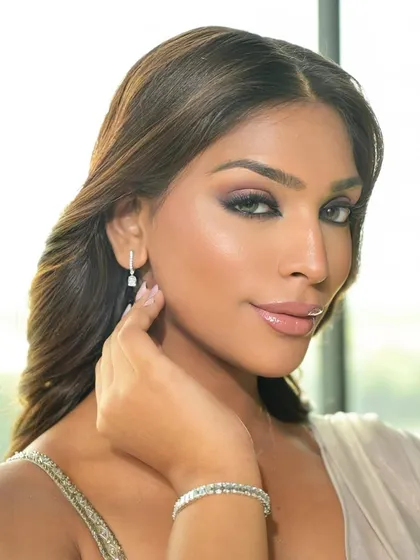 A close-up focusing on the flawless skin and soft contouring. Even with a dramatic eye, we ensure the skin looks natural and radiant.