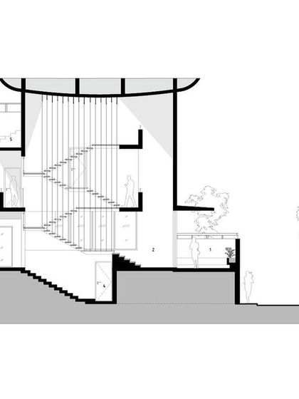 A sectional drawing of the Nairy Residence. This drawing reveals the core design concept, showing how the main staircase acts as a central spine connecting double and triple-height volumes, creating a complex and interconnected interior world.