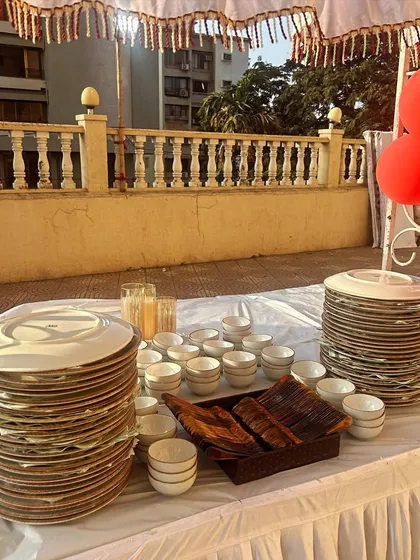 A close-up of the plate and cutlery station. I use high-quality, elegant tableware to elevate the dining experience, even at casual outdoor parties.