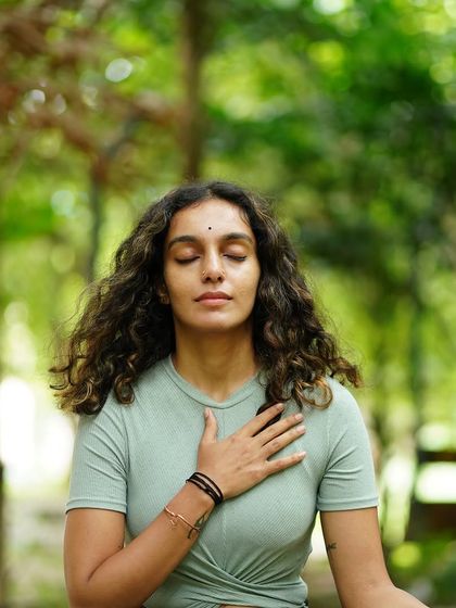 A moment of deep introspection, with my hand over my heart. It’s a reminder that we always have the power to choose between conscious pleasures like stillness and movement, or unconscious numbing.