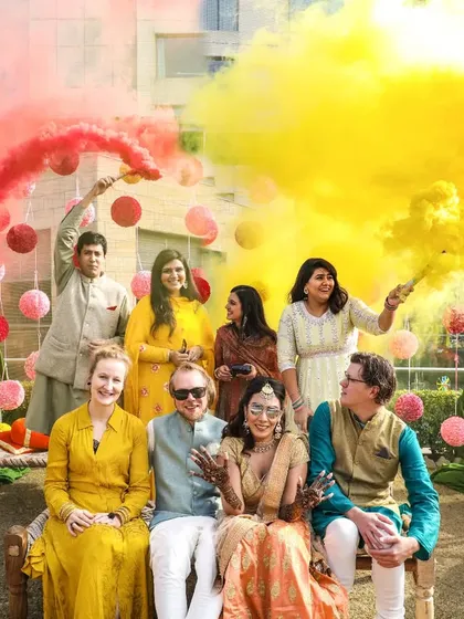 Let the colors fly! I believe in capturing the pure, unscripted fun of wedding festivities. This shot from a Haldi ceremony is all about the vibrant energy and laughter shared with family and friends.