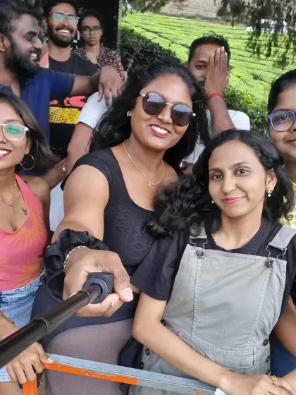 A fun selfie moment with a selfie stick amidst the tea gardens of Munnar. Our trips are perfect for capturing those social media worthy shots.