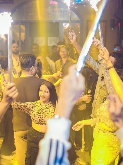 Sparklers light up the dance floor at Happy Brew, adding to the celebratory 'Mondaze' vibe.