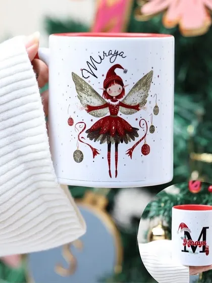 A personalised Christmas mug featuring a beautiful fairy illustration for 'Miraya'.