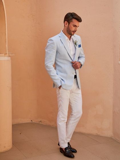 Drive away the Monday blues with this Arctic Ice Blue linen jacket. Paired with cool white chinos, it's a look that is as crisp and sharp as your presentations.