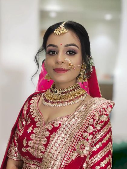 This image captures the soft, radiant finish of the bridal makeup, designed to look beautiful both in person and in photographs.