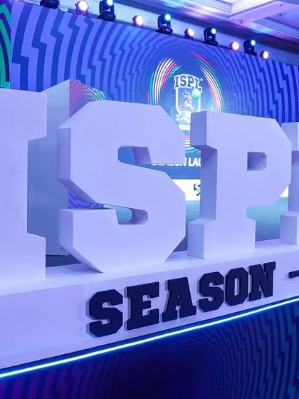 A close-up of the large 3D logo for ISPL Season 3 on stage. Our production team fabricates these custom branding elements for our clients.