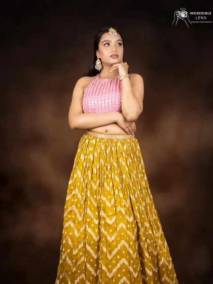 A colorful makeup look perfect for a sangeet or mehendi. I teach how to play with colors like pink and yellow on the eyes in my pro makeup class.
