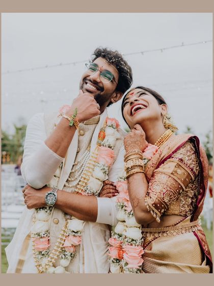 A goofy, happy pose from the bride and groom. Their personalities shining through is what makes a wedding album truly theirs.