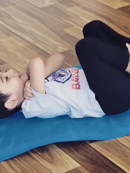 Finding rest and joy in Ananda Balasana, or happy baby pose. This is a favorite in kids' classes as it’s playful and also gently stretches the inner groins and back spine.