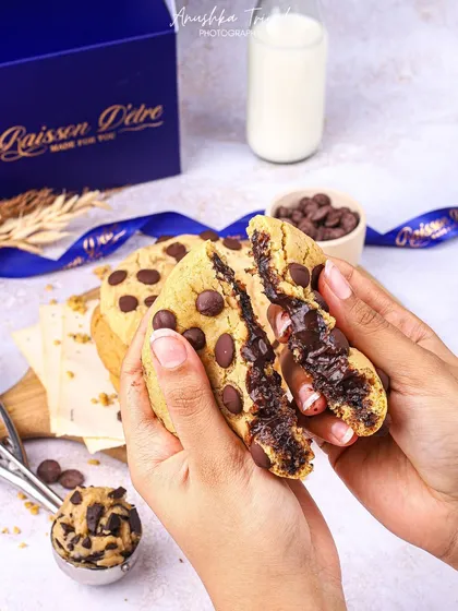 Nothing beats a perfect cookie-break shot. Here, I captured the moment of breaking a warm, gooey, chocolate-filled cookie, a visual that instantly triggers cravings.