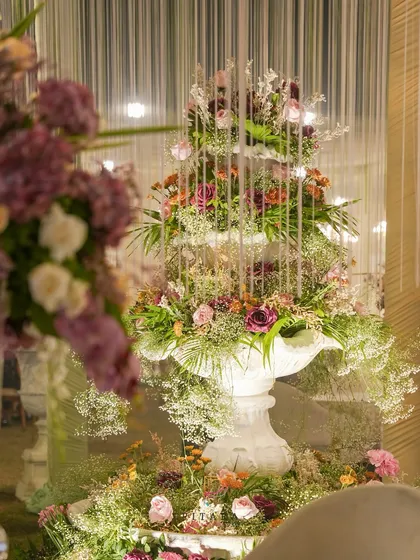 This floral fountain was a true showstopper. Instead of water, it overflows with layers of blush, mauve, and lavender blooms, creating a romantic and artistic centerpiece for the Nikaah ceremony.
