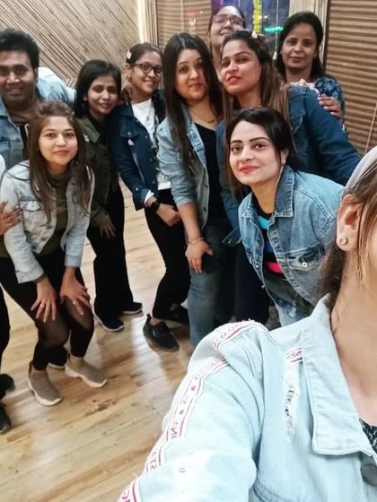 Another take of our denim day selfie. The smiles are genuine and the energy is real.