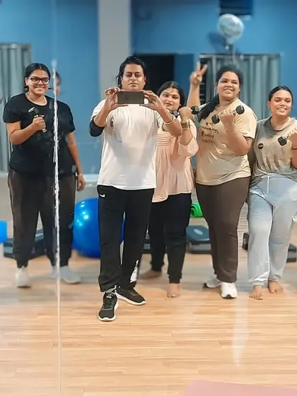 That post workout feeling! This is our amazing fitness family here in Koramangala after a tough but rewarding dumbbell session. We work hard, we sweat, and we always finish with a smile.