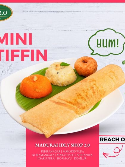 A mini feast that packs a punch, featuring a small dosa, vada, upma, and kesari.